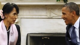 U.S. President Barack Obama meets with Aung San Suu Kyi at the White House in Washington, September 19, 2012.