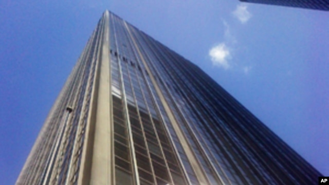 Flag at half mast by New York skyscraper where Japan's consulate is located