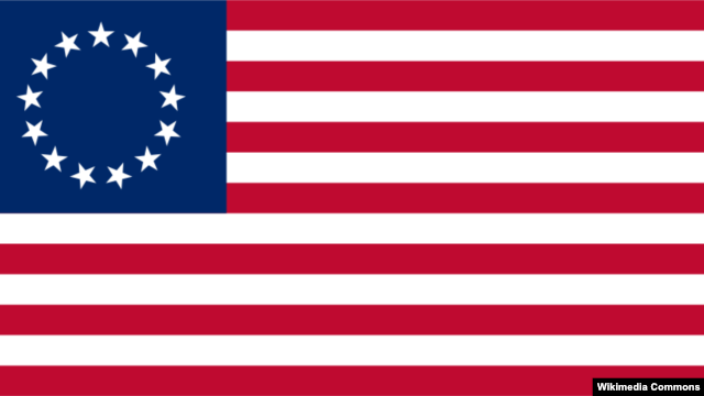 Early American flag with 13 stars representing the 13 states