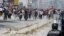 Supporters of Islamist group Ansar al-Sharia clash with riot police at Hai al-Tadamon in Tunis, May 19, 2013. 