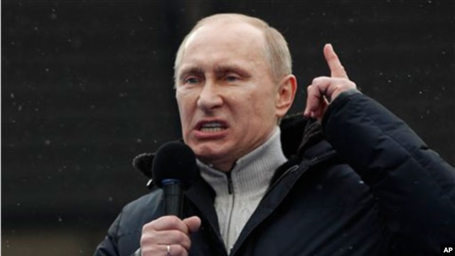 Russian Prime Minister Vladimir Putin speaks during a massive rally in his support at Luzhniki stadium in Moscow, February. 23, 2012.
