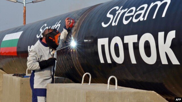 FILE - A picture taken Oct. 31, 2013 shows a worker welding pipes during the symbolic start of the construction of the Bulgarian section of Russian gas giant Gazprom's South Stream pipeline near the village of Rasovo.