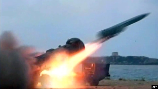 A handout picture released by the Syrian Arab News Agency on July 7, 2012, shows a missile being fired during a military excercise (AFP photo/ HO / SANA).