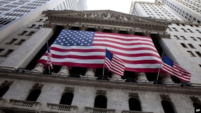 US flag flies from the New York Stock Exchange in New York, August 5, 2011