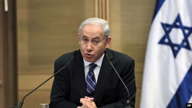 Israel's Prime Minister Benjamin Netanyahu (L) speaks during a joint news conference with Shaul Mofaz (not seen), head of the Kadima party which join Netanyahu's rightist coalition, at parliament in Jerusalem, May 8, 2012.