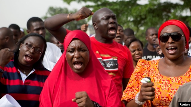 People demand for the release of secondary school girls abducted in the remote village of Chibok, during a protest at Unity Park in Abuja, May 11, 2014.