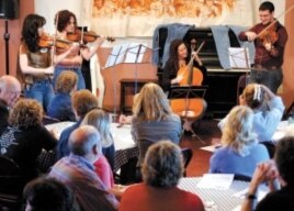 Ed Klorman, director of the Center for Music Entrepreneurship, encourages students to try different venues to showcase their music. Here he performs at one of his Classical Blue Jeans Concerts.