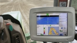 A GPS unit inside a tractor on a farm in Tallula, Illinois