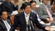 Japanese Prime Minister Shinzo Abe answers a question by an opposition lawmaker at the Upper House at the National Diet in Tokyo, April 23, 2013.