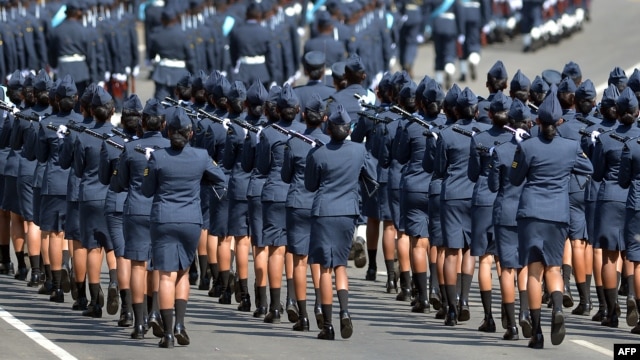 FILE - Sri Lankan military personnel march during the country's 66th Independence Day celebrations in the central town of Kegalle, about 40 kms from the capital Colombo.