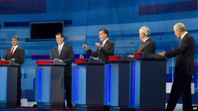 Republican presidential candidates, from left to right: Texas Gov. Rick Perry; former Pennsylvania Sen. Rick Santorum; former Massachusetts Gov. Mitt Romney; former House Speaker Newt Gingrich; and Rep. Ron Paul, R-Texas take part in the South Carolina Re