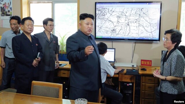 FILE - North Korean leader Kim Jong Un gives field guidance to the Hydro-meteorological Service.