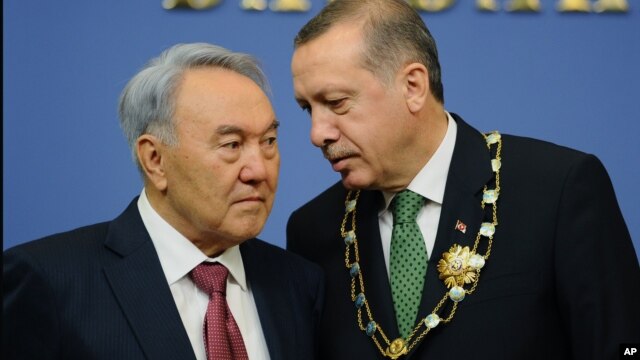 Turkey's Prime Minister Recep Tayyip Erdogan, right, and Kazakh President Nursultan Nazarbayev seen during a press conference in Ankara, October 11, 2012.