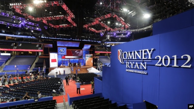 Workers prepare the stage for the Republican National Convention inside the Tampa Bay Times Forum in Tampa, Florida, Aug. 25, 2012. 