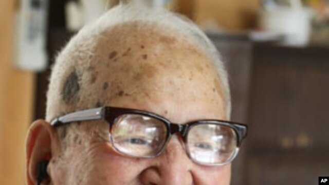 Jirouemon Kimura, of Japan, smiles on his 114th birthday in April 2011. A new study finds happy people tend to live longer.