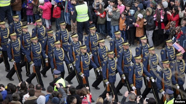 Members of the Kosovo Security Force march during a celebration marking the fifth anniversary of Kosovo's secession from Serbia in Pristina February 17, 2013.