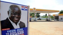 A poster of the presidential candidate of the opposition New Patriotic Party counterpart Nana Akufo-Addo is seen at the entrance of a gasoline station in Accra, October 23, 2012 