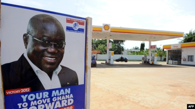 A poster of the presidential candidate of the opposition New Patriotic Party counterpart Nana Akufo-Addo is seen at the entrance of a gasoline station in Accra, October 23, 2012 