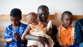Children enjoy ice cream at Sweet Dreams in Rwanda. (Piper Watson)