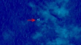 Hình ảnh vệ tinh của Trung Quốc cho thấy 3 vật thể lớn trên đường bay nguyên thủy của chuyến bay bay về hướng Bắc Kinh.