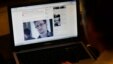 Tom Grundy, an activist, blogger and co-organizer supporting Edward Snowden's campaign, browses the live chat with Snowden on the Guardian website in his house in Hong Kong, June 17, 2013.