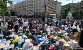 Macedonians collect humanitarian aid of food, hygienic products, clothing and bottled water intended for the flooded regions in Serbia and Bosnia-Herzegovina, in Skopje, Macedonia, May 18, 2014.