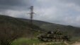 Armenian soldiers patrol on a tank near the village of Madaghis in Nagorno-Karabakh, Azerbaijan, April 6, 2016. Two Armenian soldiers were killed in fighting with Azerbaijani forces Friday even though a cease-fire appears to be largely holding.