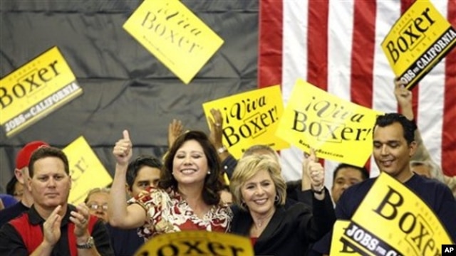 U.S. Secretary of Labor Hilda Solis, left, and U.S. Sen. Barbara Boxer, D-Calif. address get-out-the-vote volunteers at the International Association of Firefighters Local 1014, 31 Oct. 2010, in El Monte, California