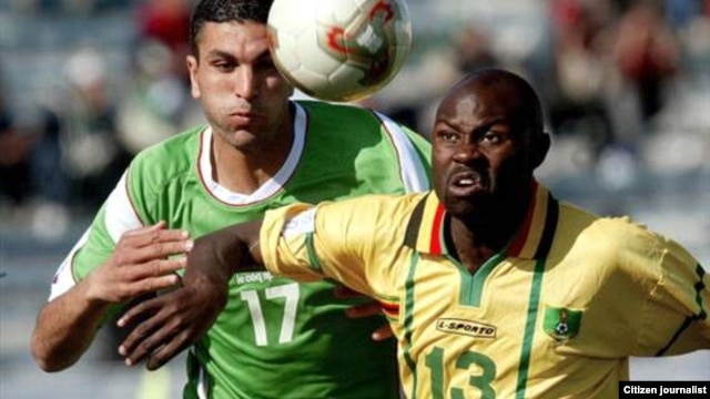Former Warriors star striker, Adam Ndlovu (right)