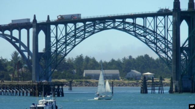 A charter fishing boat heads to sea from Newport, Oregon.
