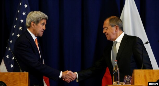 U.S. Secretary of State John Kerry and Russian Foreign Minister Sergei Lavrov shake hands at the conclusion of their press conference following their meeting in Geneva, Switzerland, Sept. 9, 2016.