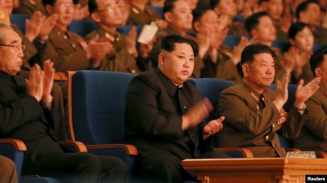 North Korean leader Kim Jong Un, center, applauds during a concert in this undated photo released by North Korea's Korean Central News Agency (KCNA) in Pyongyang, Feb. 23, 2016. U.N. diplomats told reporters about a new sanctions agreement Wednesday, a day before the U.N. Security Council is set to hold closed consultations on the issue.