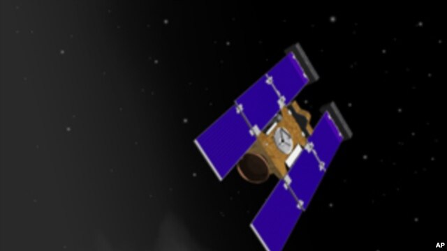 Artist rendering of Stardust-NExT spacecraft nearing comet Tempel 1, 21 Jan 2011