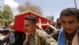 Houthi fighters carry the coffin of a comrade killed during recent fighting, during the first day of a cease-fire in Yemen's capital Sana'a, April 11, 2016. 