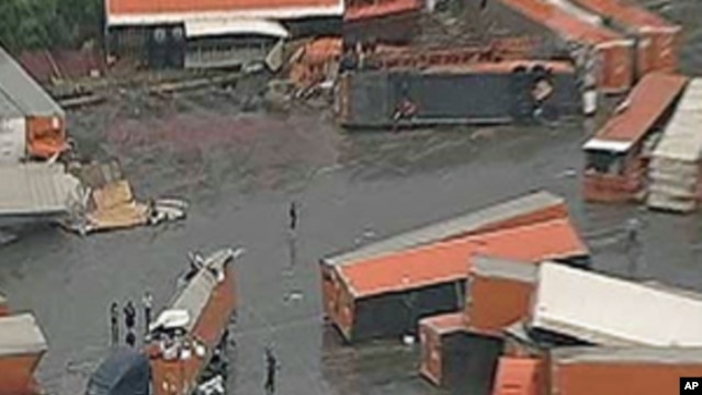 Trucks damaged by a  tornado in  Lancaster, Texas, March 3, 2012.
