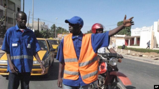Senegal is scheduled to receive U.S. aid to help build new roads, but some experts worry about the direction the country is headed