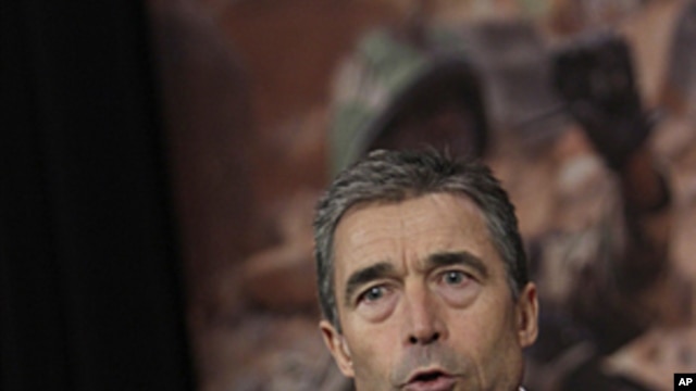 NATO Secretary-General Anders Fogh Rasmussen speaks during a media conference after a meeting of NATO defense ministers at NATO headquarters in Brussels on June 9, 2011.