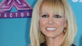 Britney Spears arrives at the "X Factor" season finale press conference at CBS Studios on Dec. 17, 2012, in Los Angeles.