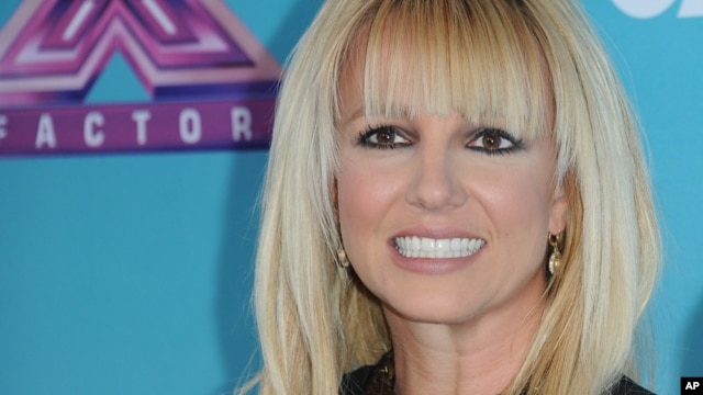 Britney Spears arrives at the "X Factor" season finale press conference at CBS Studios on Dec. 17, 2012, in Los Angeles.