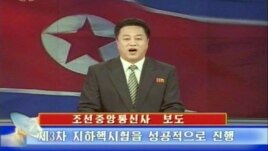 North Korean TV on Feb. 12, 2013 shows an announcer reading a statement on the country's nuclear test. (North Korean TV)