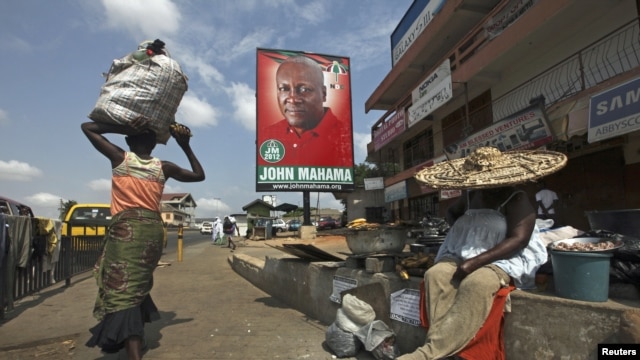 A poster shows John Dramani Mahama, Ghana's interim president and National Democratic Congress (NDC) presidential candidate, on a street in Accra, December 2, 2012.