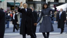 Predsednik Obama sa suprugom Mišel tokom inauguracione parade u Vašingtonu