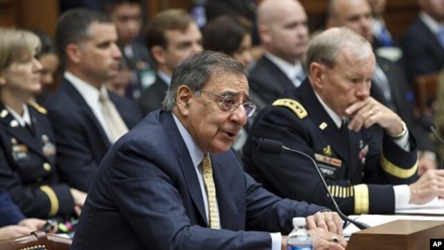 Defense Secretary Leon Panetta, left, accompanied by Joint Chiefs Chairman Gen. Martin Dempsey, testifies on Capitol Hill, April, 19, 2012, before the House Armed Services Committee hearing on recent developments with the crisis in Syria.