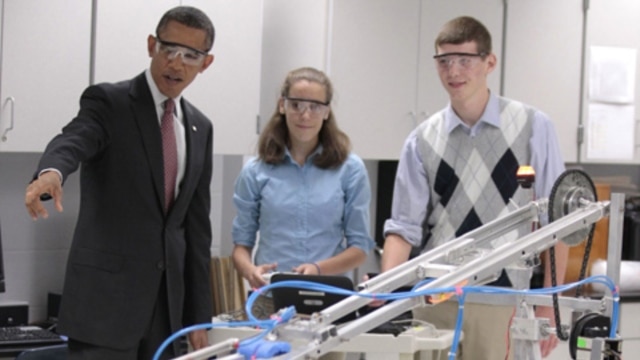 President Obama with students Meghan Clark and Nathan Hughes and a robot last month at Thomas Jefferson High School for Science and Technology in Alexandria, Virginia