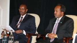 VOA's Harun Maruf and President of Somalia Hassan Sheikh Mohamud attend VOA's Youth London Town Hall meeting in May 2013