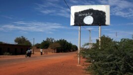 A sign for the radical Islamist group MUJAO is seen in Douentza, Mali, January 29, 2013.
