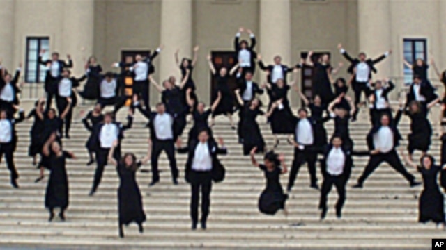The Yale Glee Club, seen here leaping on the steps of the main concert hall in the Dominican Republic, is celebrating its 150th anniversary.