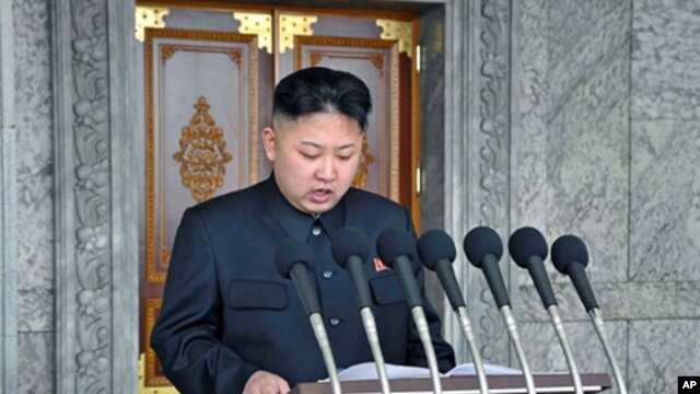 North Korean leader Kim Jong Un delivers a speech during a mass military parade in Kim Il Sung Square, April 15, 2012. 