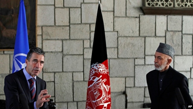 NATO Secretary-General Anders Fogh Rasmussen (l) during a joint press conference with Afghan President Hamid Karzai at the presidential palace in Kabul, March, 4, 2013. 