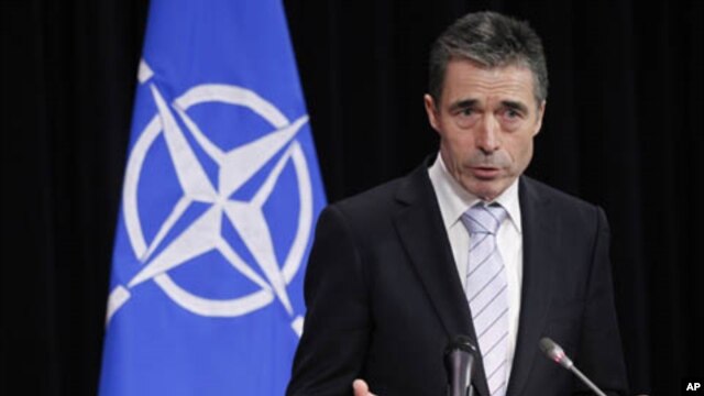 NATO Secretary General Anders Fogh Rasmussen addresses a news conference during a NATO defense ministers meeting at the Alliance headquarters in Brussels, February 3, 2012.